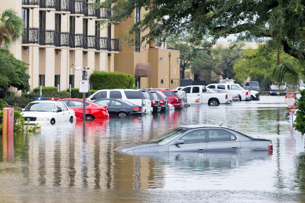 Image of cars in flooded parking lot